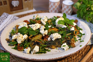 Fried zucchini with feta and herbs