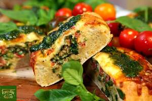 Egg boats with tomatoes, herbs and cheese