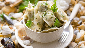 Varenyky with flounder and parsley