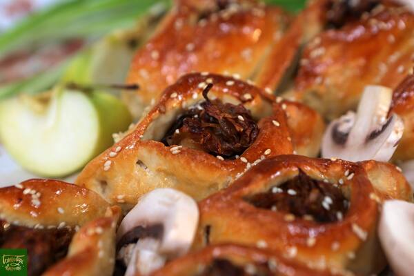 Rasstegai with cabbage and mushrooms